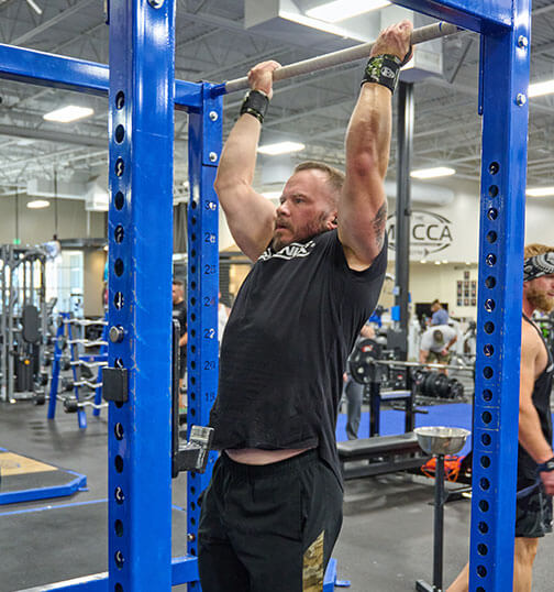 Gen-X Man doing a pull up